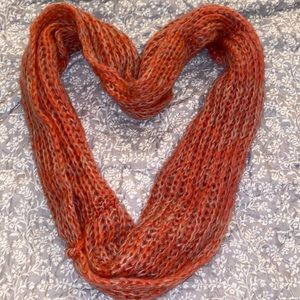 Orange/red knitted scarf